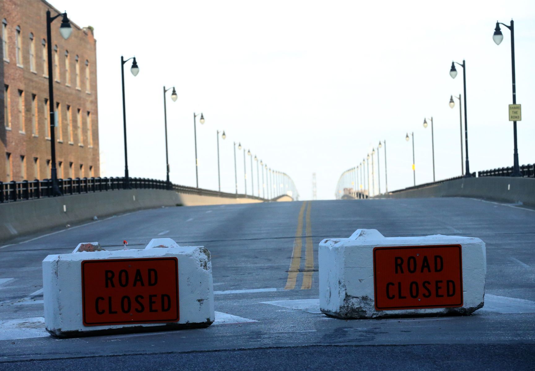 Concrete barriers close off vehicular traffic on Eads Bridge